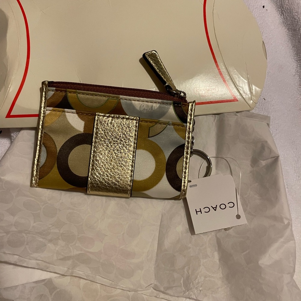 Coach Gold and Brown Circle Pattern Wristlet